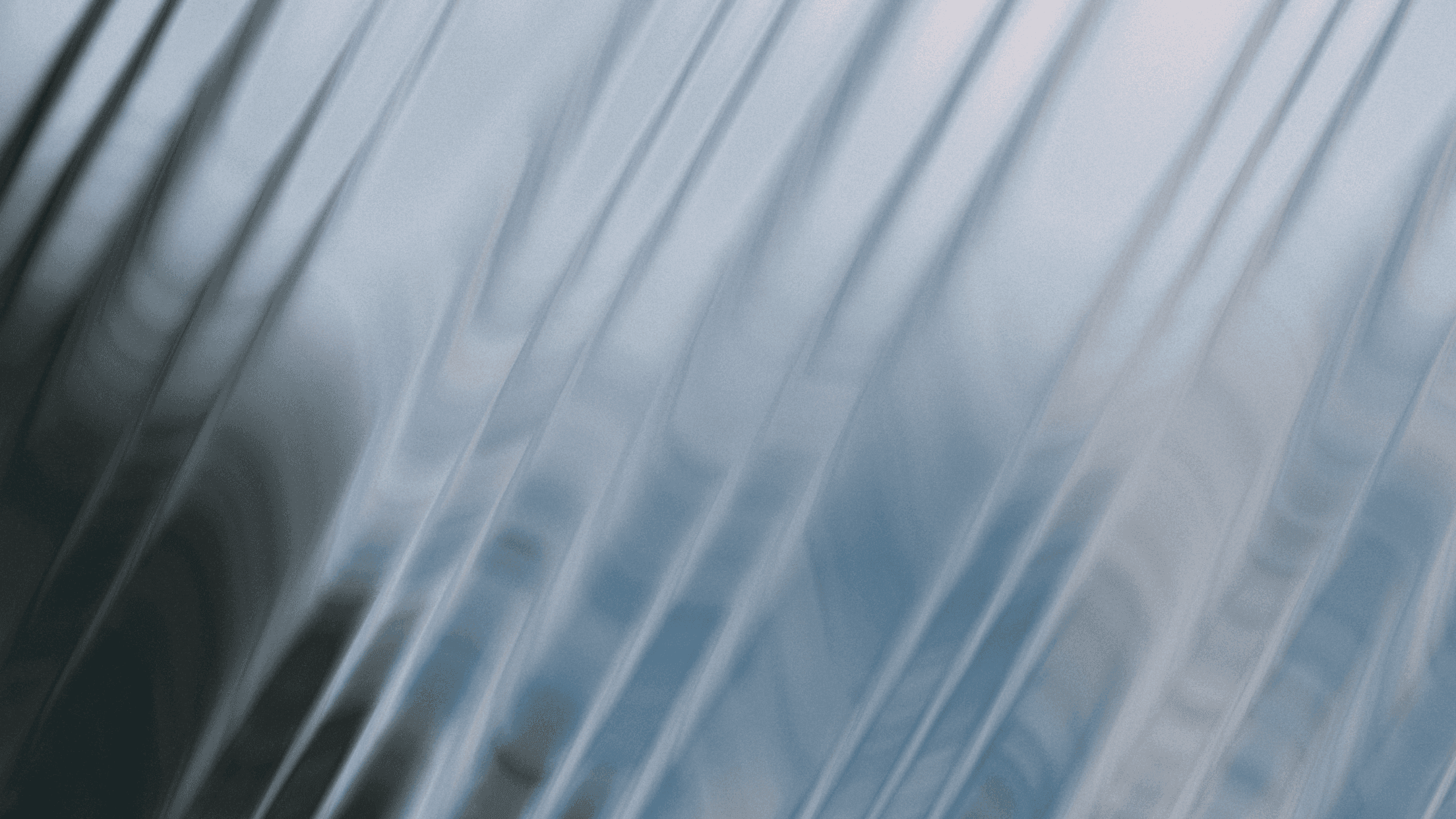 Blurred blue-grey abstract streaks